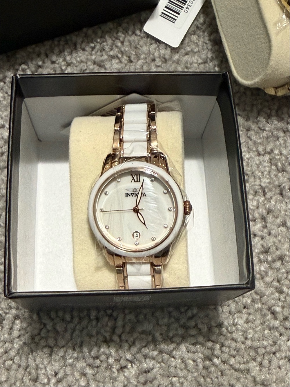 Invicta Women’s White and Rose Gold Ceramic Accent Bracelet Watch